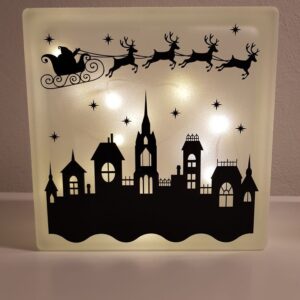 Lyssten med julemotiv - julemand over by